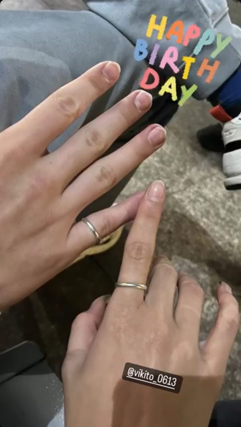 Our hands with matching rings