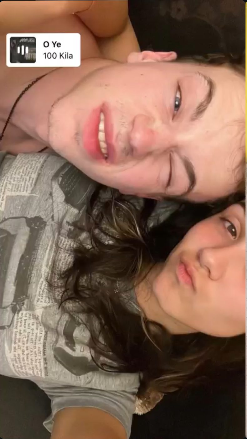 Us lying down together on our first trip